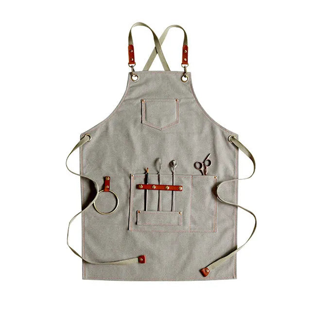 Canvas apron with cross-back straps in camel colour