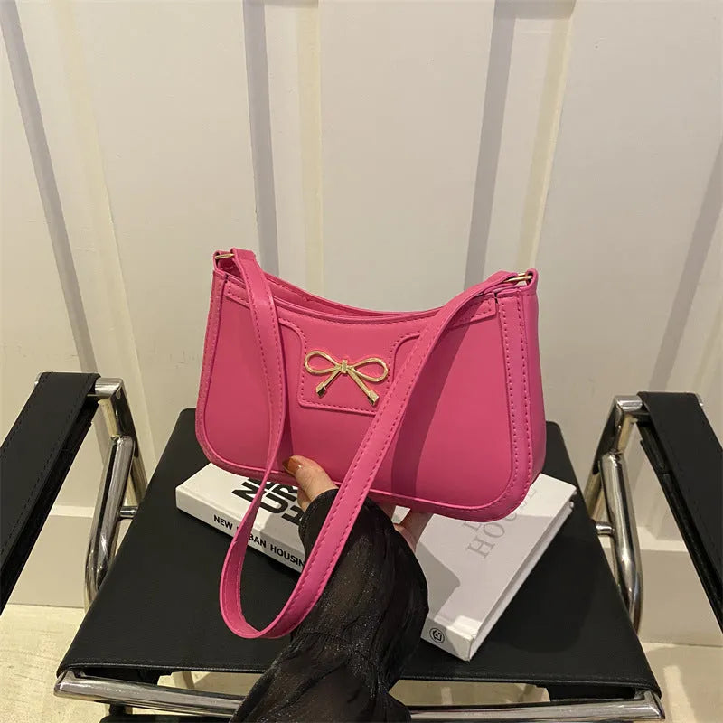 PU leather Western style baguette shoulder bag with bow detailing in six colour options