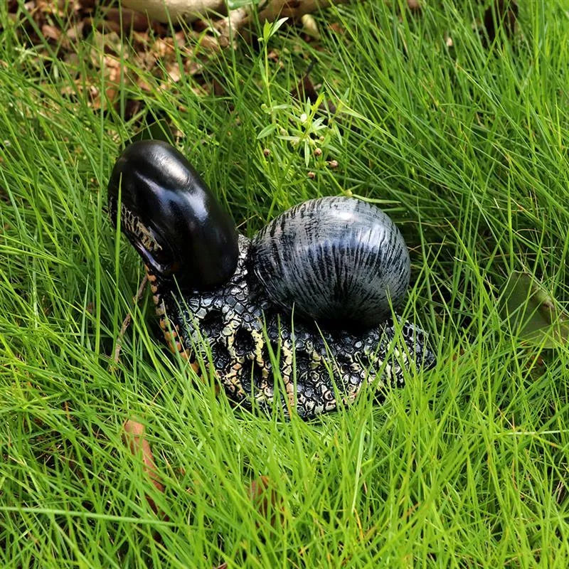Resin evil snail character sculpture for modern garden decoration outdoors.