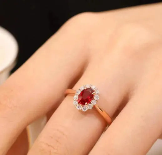 Women's sterling silver ring with gold pigeon red blood gemstone floral inlay
