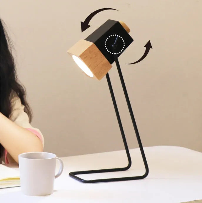 7W LED desk lamp with rubber wood and iron art body, rotary and button switch, eye protection and anti-myopia functions.