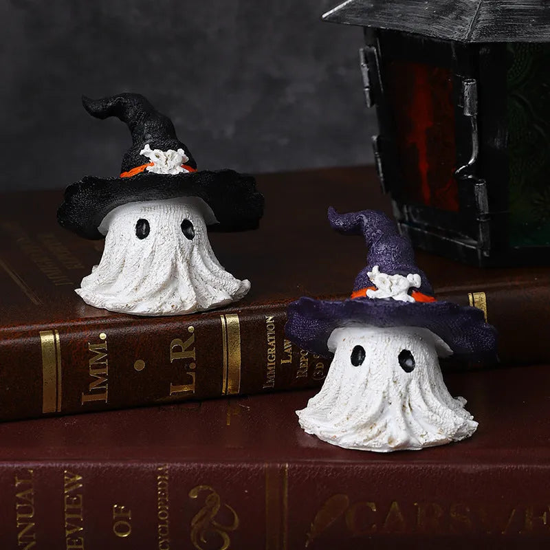 Black and purple resin wizard hat holiday ornament on a festive background.