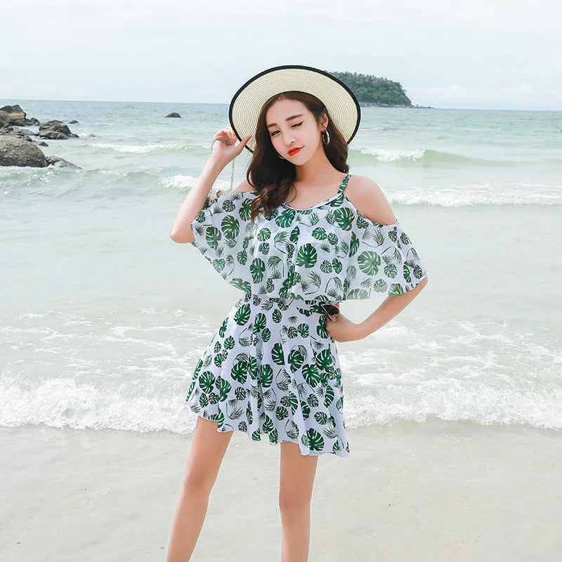 Women's personalised one-piece swimsuit in polyester with green leaf or black letter style print