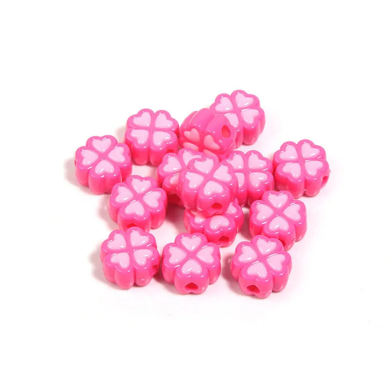 15mm acrylic clover craft beads with frosted finish in multiple colours including pink, blue, yellow, and green
