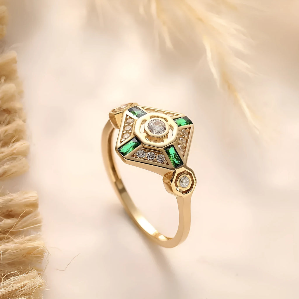 Square cut emerald diamond women's fashion ring with a lvzuan green stone on a silver electroplated band.
