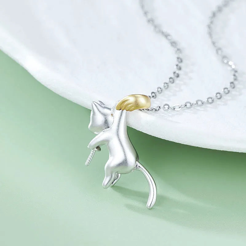 Sterling silver clavicle-length necklace with a cat charm pendant.