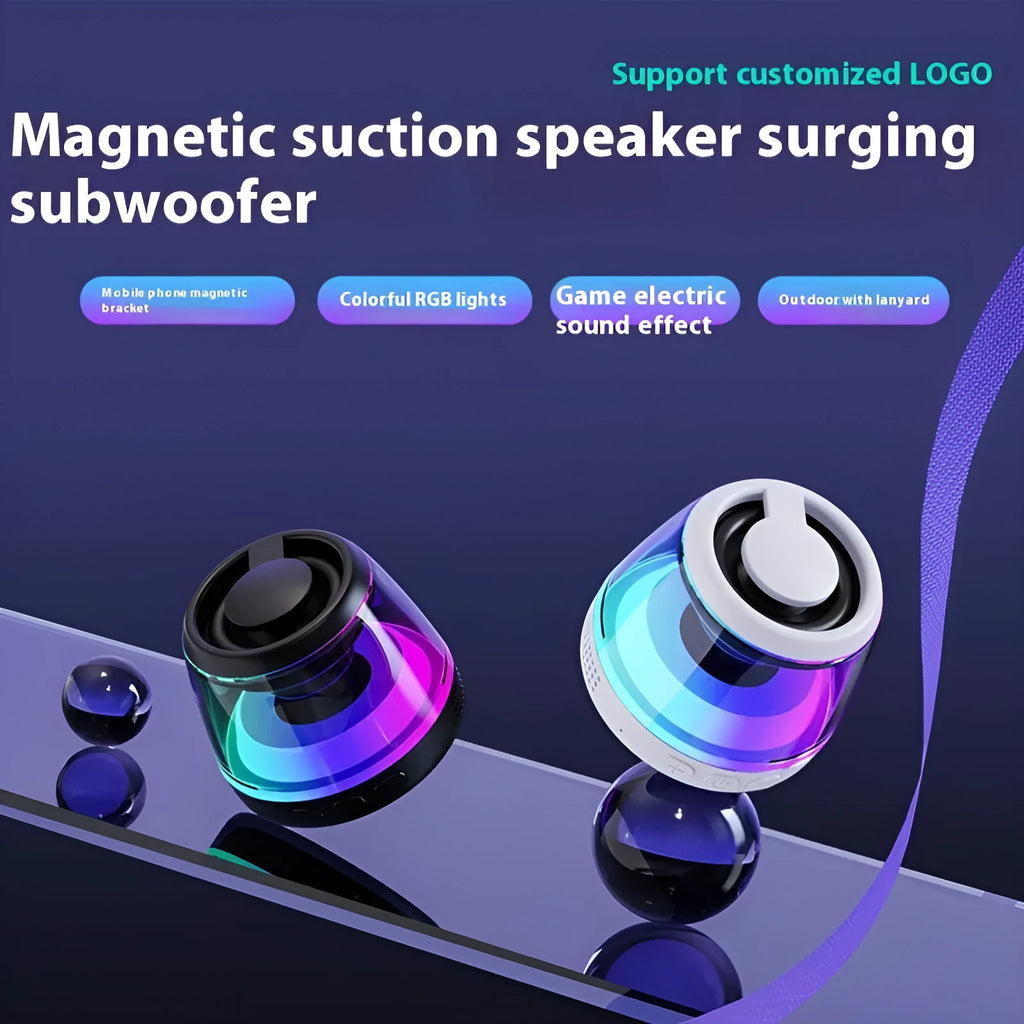 Portable white Bluetooth speaker with magnetic base, mood light, and card slot on a desk.