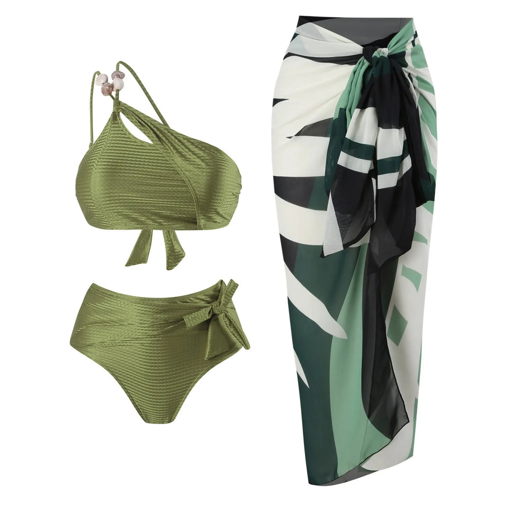 Women's brown push up high waist swimsuit with a split brief design and a sheer black chiffon dress overlay.
