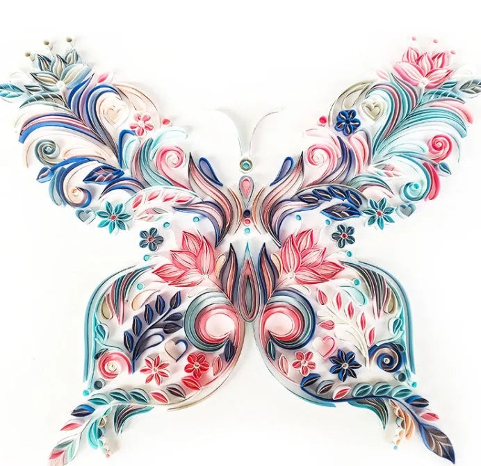 Handmade 20-inch Blue and Pink butterfly quilling paper craft kit with tools on a table