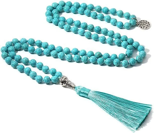 Handmade knotted stone bead necklace with 108 beads, showing geometric design and natural stone colours.