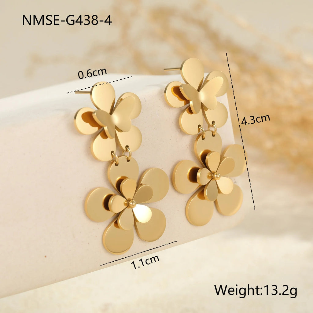 Gold flower butterfly stainless steel earrings for women with geometric details