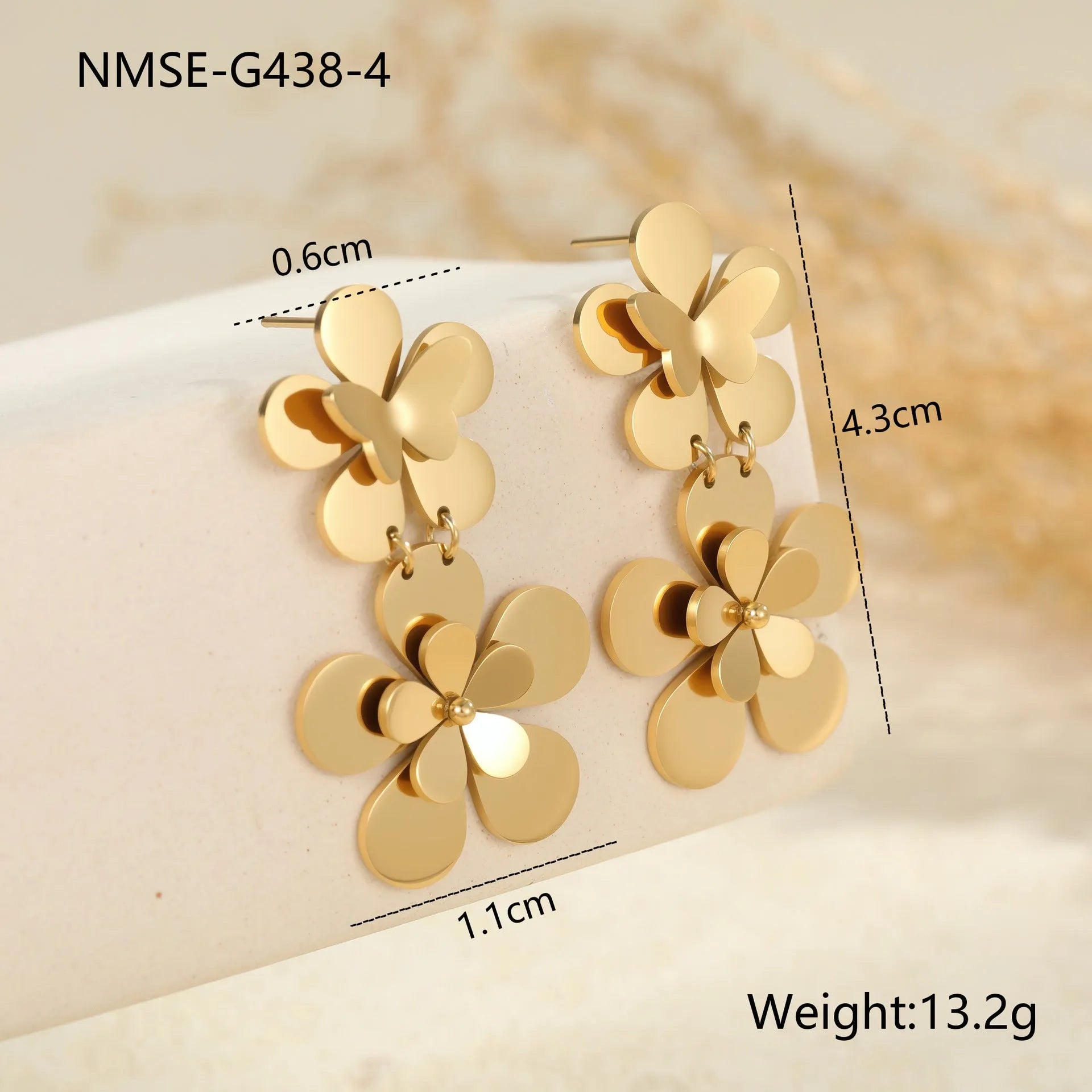 Gold flower butterfly stainless steel earrings for women with geometric details