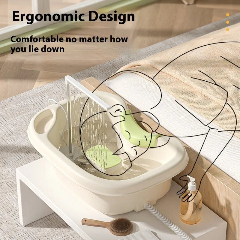 Light pink lying-in-bed shampoo basin with neck pillow and water pump