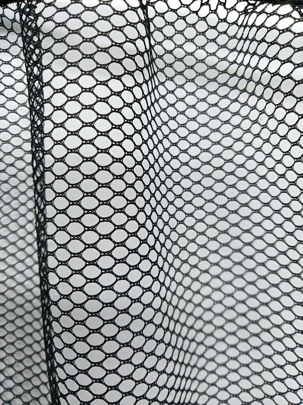 Black elastic polyester storage net for organising items in a car boot, shown in 20x35cm and 20x45cm sizes.