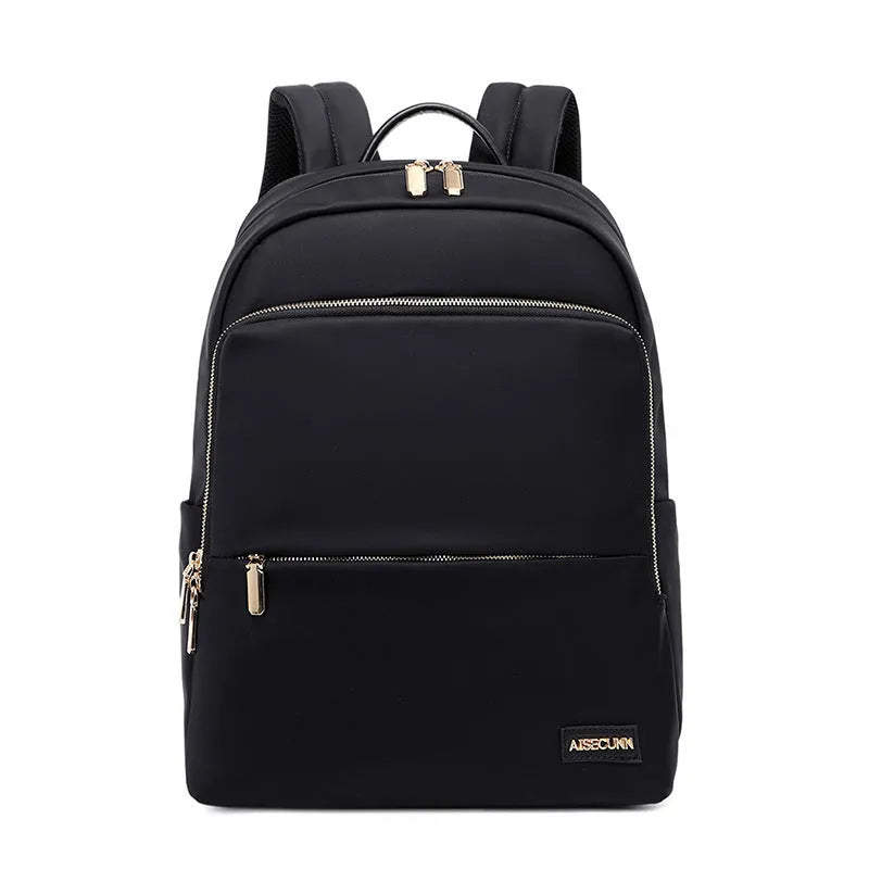 Large black oxford cloth women's backpack with anti-theft compartments and padded straps.