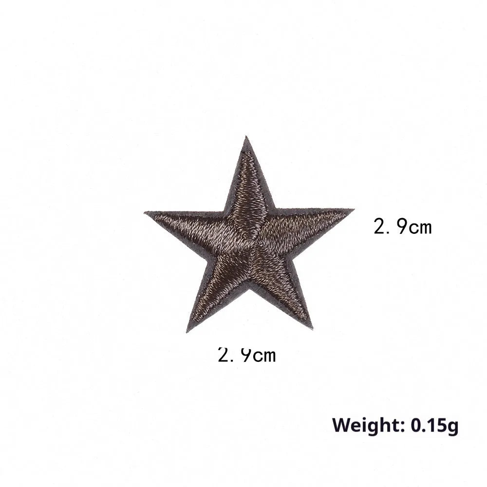 Colourful five-pointed star cloth embroidery stickers for DIY clothing decoration on a fabric background.