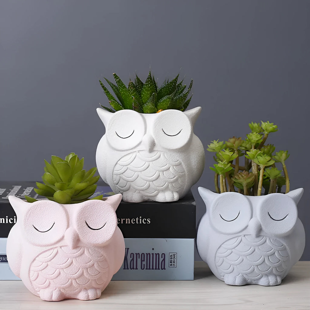Handmade frosted owl ceramic succulent pot in light pink, showing cartoon design and 11cm size.