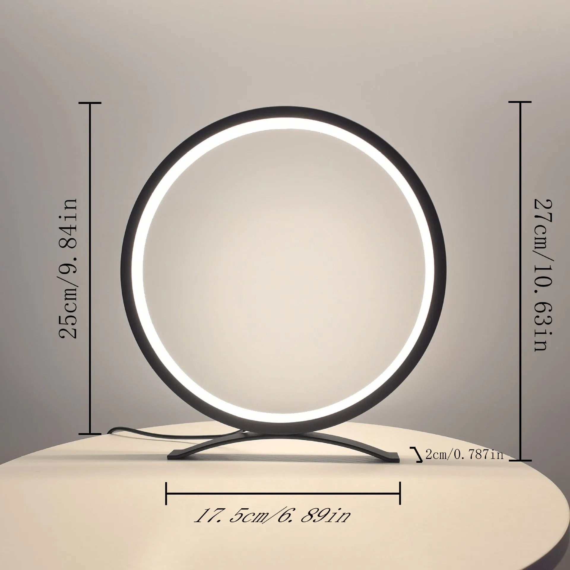 Modern minimalist desk lamp with metal stand, USB cable, and compact 25cm base in black warm light finish