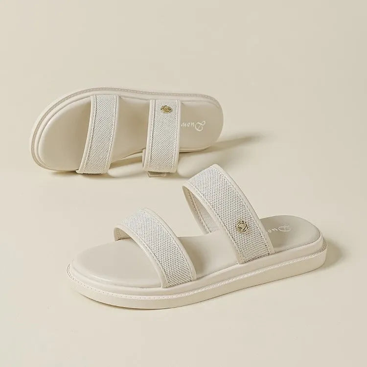 Women's brown and black soft bottom flip-flops with artificial PU upper and retro style