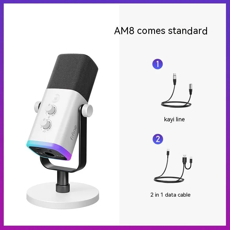 Black, pink, or white dynamic noise reduction microphone with XLR cable and base on a desk.