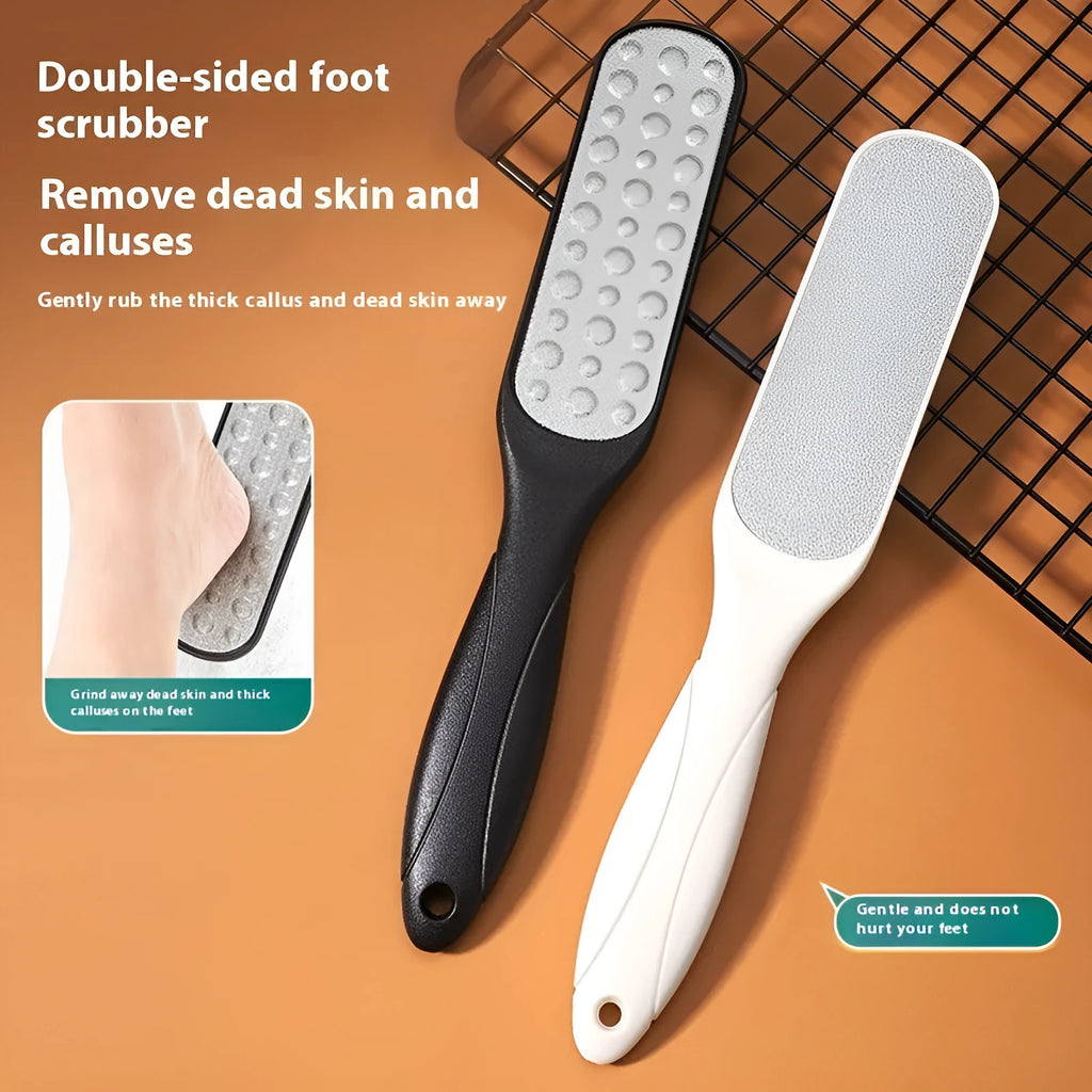 Stainless steel foot grinder file with attached sandpaper pad and separate black and white refill packs.