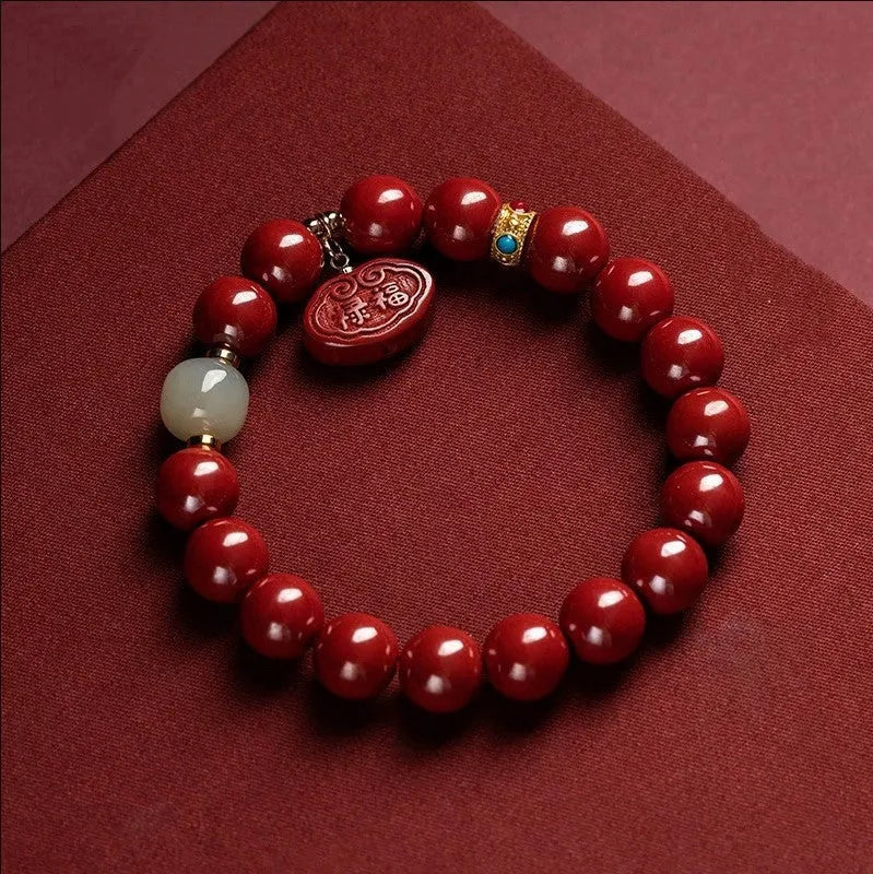 Natural cinnabar Emperor sandstone bracelet with traditional Ping An Fu Lu motifs