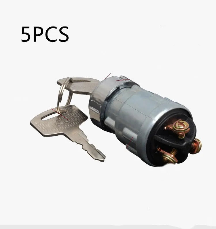 Copper vehicle ignition switch with a key for trucks and forklifts.