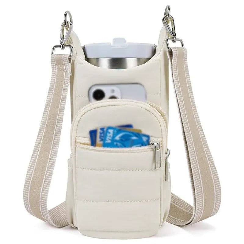 Cycling water bottle kettle bag mounted on bicycle frame in beige colour