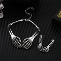 Dark style skull and ghost hand necklace and earrings set in silver or black electroplated alloy with 41-50cm chain