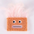 Catnip plush toy with big mouth explosion head shape in blue, green, orange, and purple colour options