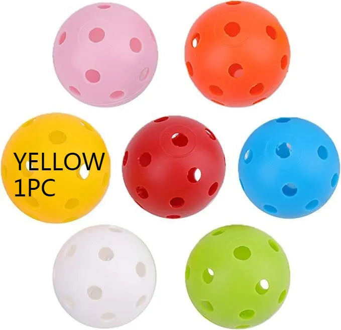 Multi-coloured 42mm golf practice balls with dimpled design in a net bag.