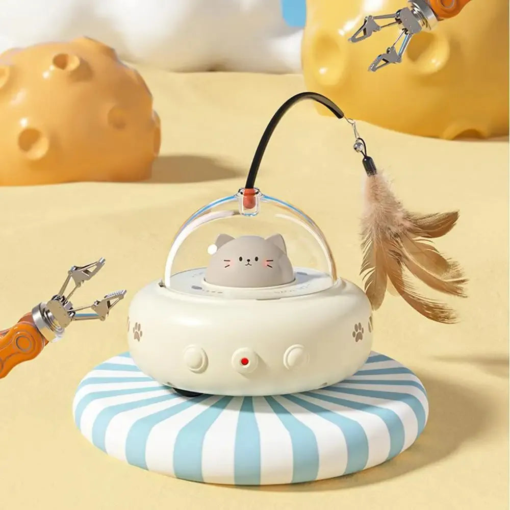 Electric interactive cat toy with feather teaser, 360 red light beam, ABS body and TPR wheels, in pink colour