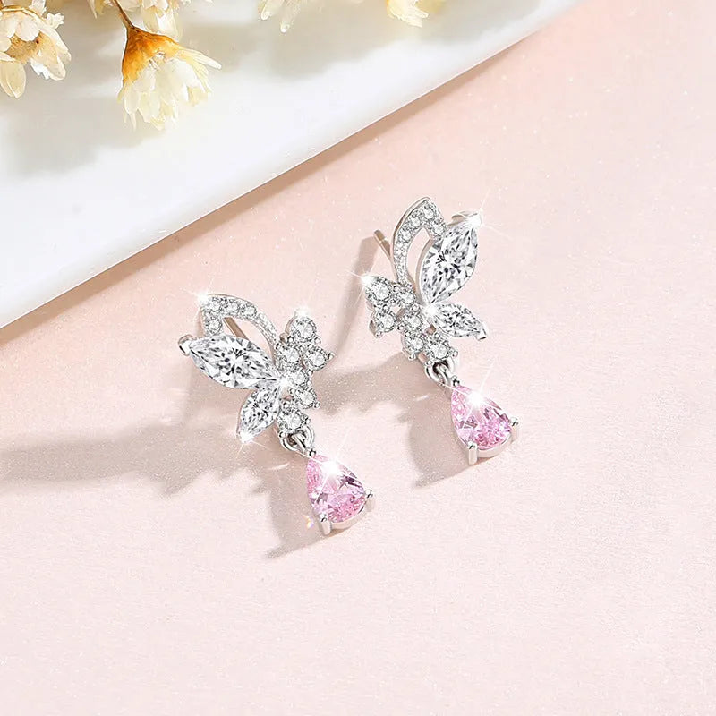Women's silver butterfly stud earrings with crystal details on 925 sterling silver posts