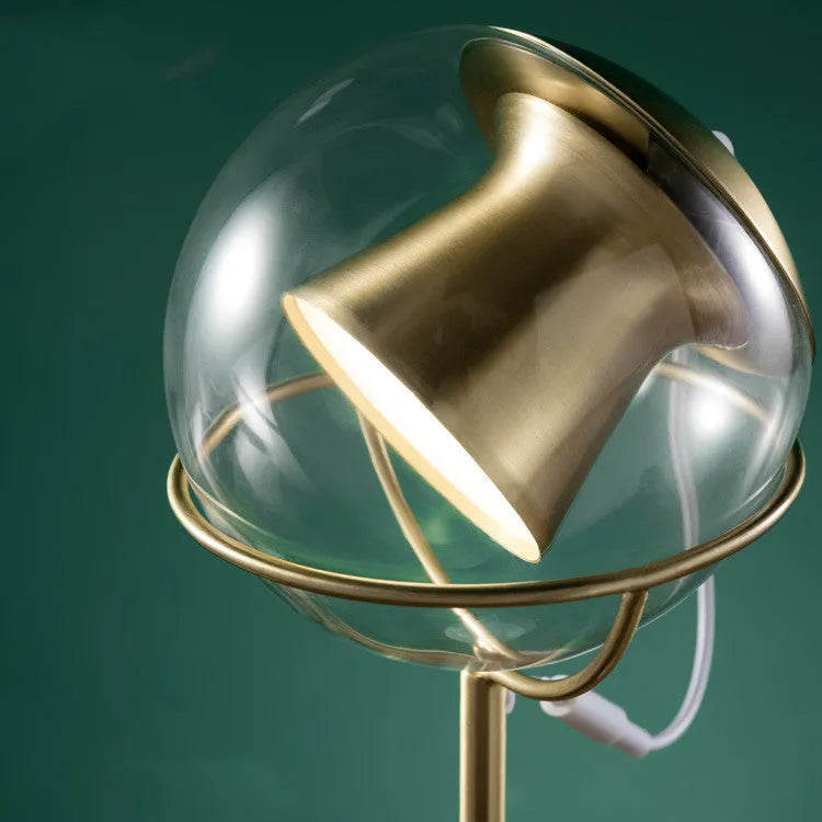 Modern glass lampshade desk lamp with touch dimmer control.