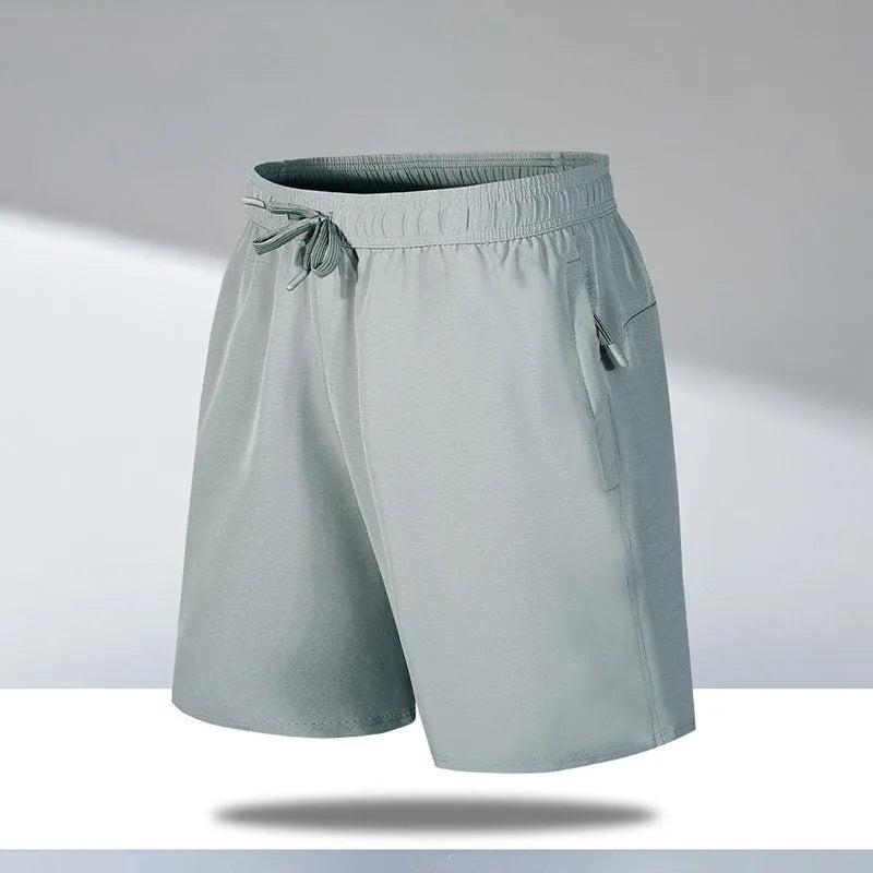 Man wearing loose fit quick-dry polyester beach shorts in a summer colour