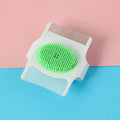 Blue multifunctional pet comb grooming tool showing compact 8.5 cm design with hair removal and massage features