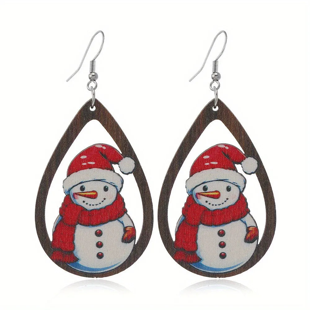 Women's wooden Christmas earrings with printed tree and snowman designs in geometric shapes