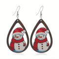 Women's wooden Christmas earrings with printed tree and snowman designs in geometric shapes