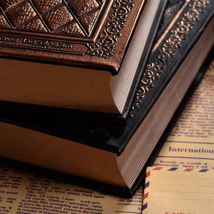 Embossed faux leather notebook with textured three-dimensional cover in bronze colour option