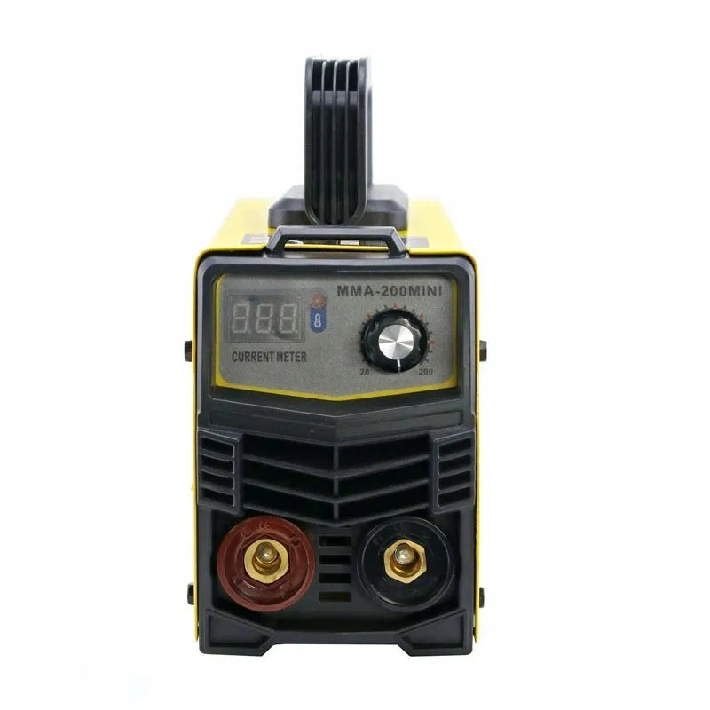 MMA-200MIN compact 220 volt DC inverter stick welding machine with electrode holder and face shield on a workbench.