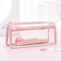 Transparent double-layer pencil case showing beige, blue, pink, purple colour options with 220x110x80mm dimensions
