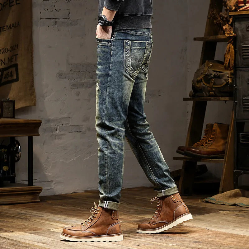 Men's skinny fit stretch denim jeans in a retro blue wash with a five-pocket design.