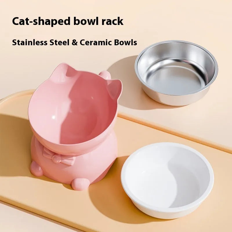 A tilted stainless steel cat bowl in blue, showing its 15-degree angle and weighted non-slip base on a kitchen floor.