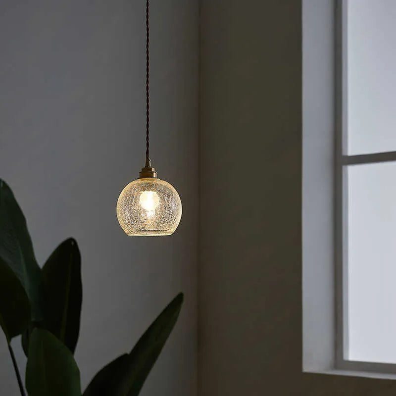 Brass and glass ball chandelier with spherical design measuring 17.5cm diameter
