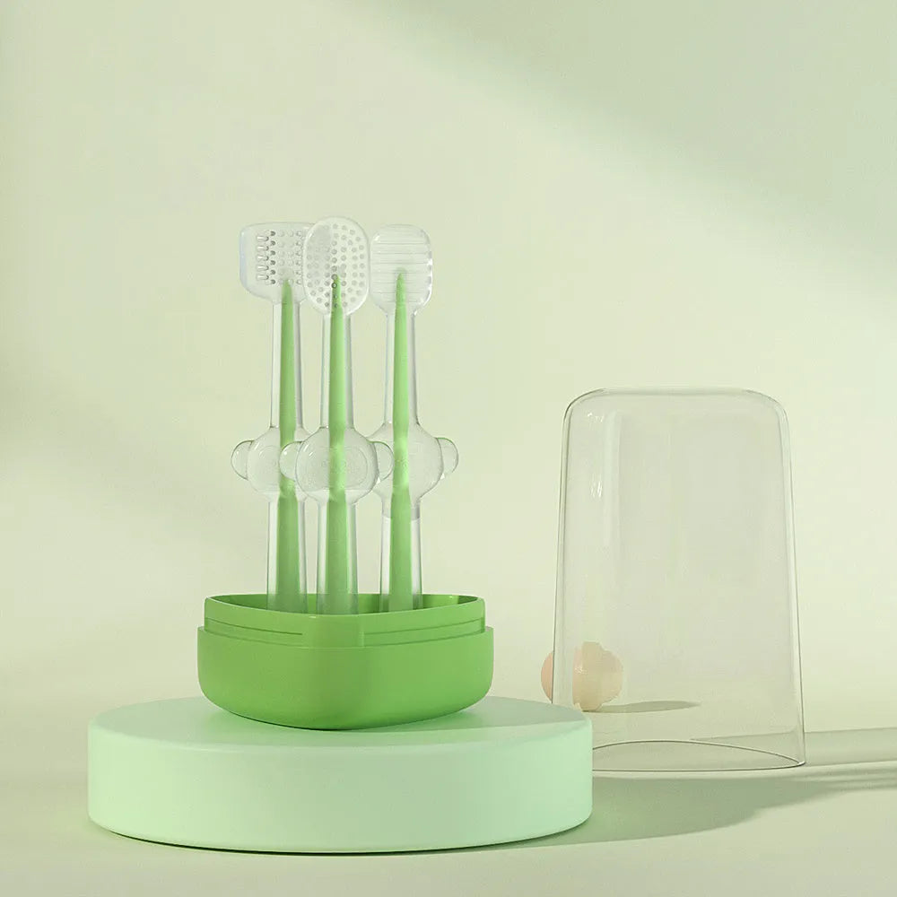 Blue, green, and purple pet toothbrushes with soft silicone bristle heads for dogs and cats.