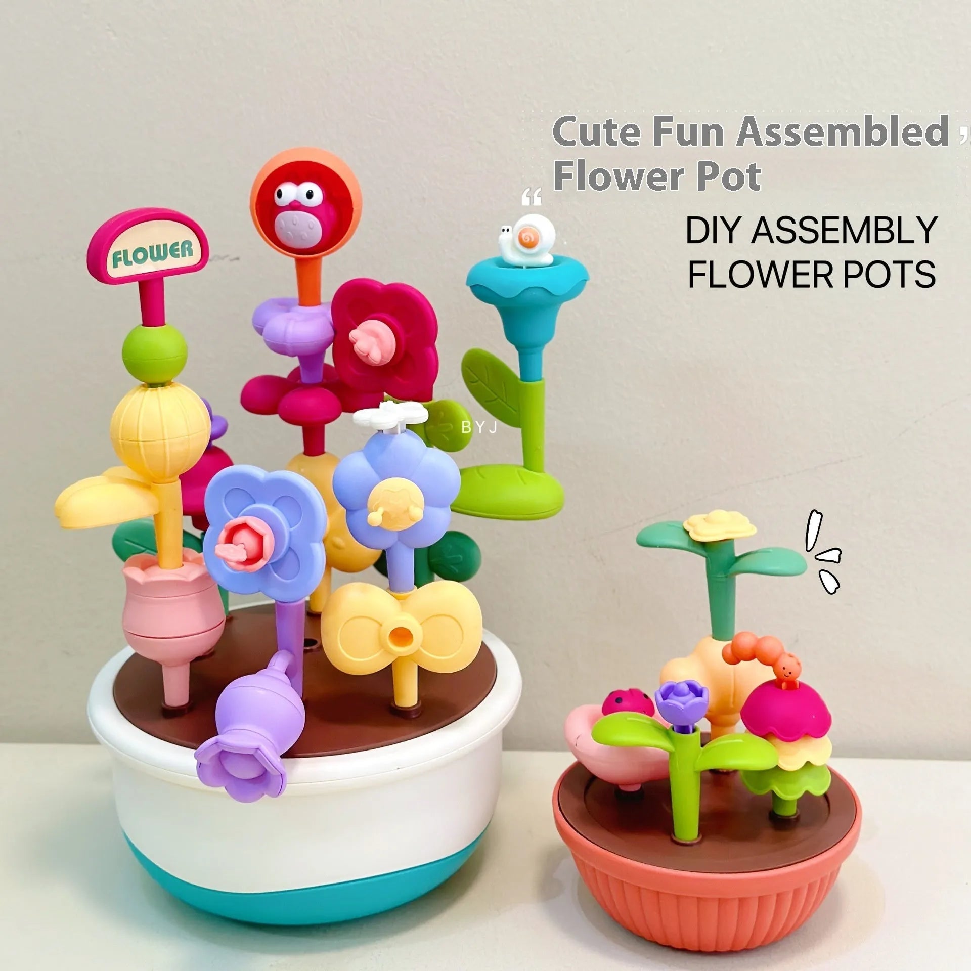 Colourful plastic flowerpot building block set with assorted flower-shaped pieces, in a colour box