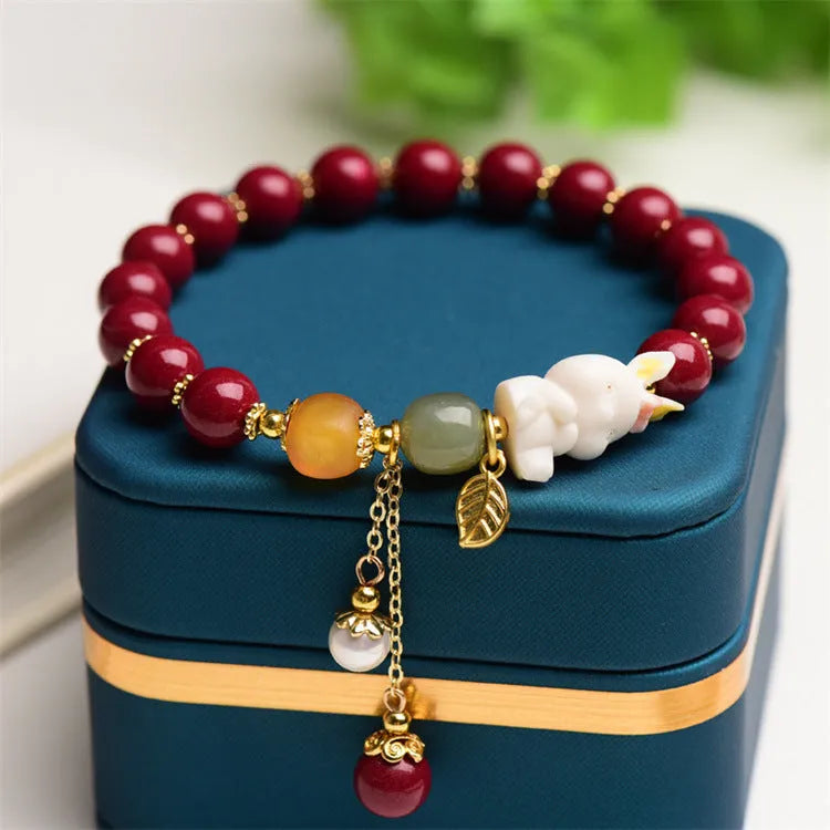 Natural cinnabar bracelet with rabbit design in traditional Chinese style
