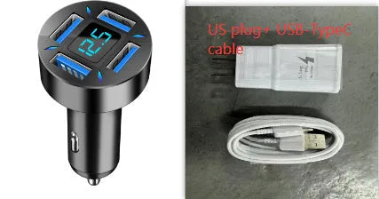 Black four-port USB car charger with LED voltage display plugged into a car socket.