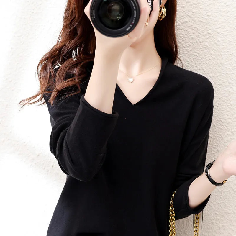Women's V-neck long sleeve knitwear pullover top in turmeric colour with non-ironing finish