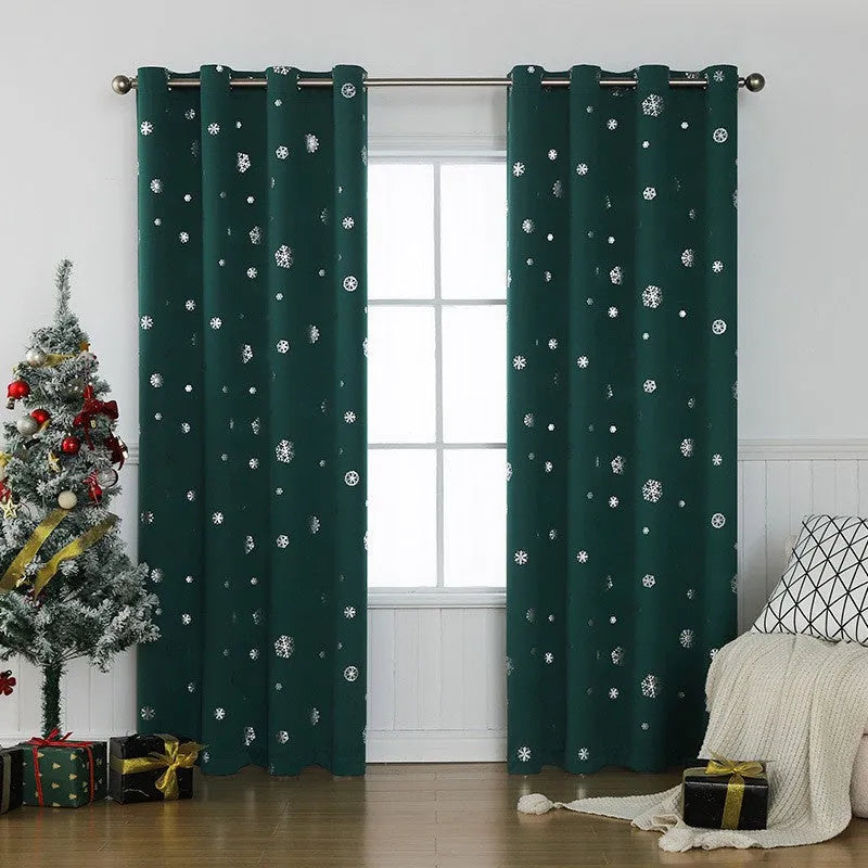 Red or green snowflake pattern shade cloth curtain with coordinating lace loops and iron hoops